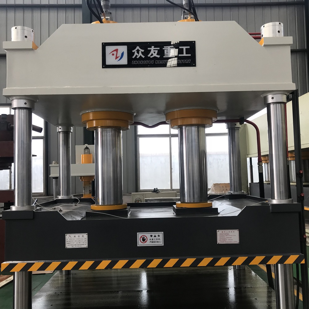400T雙(shuang)缸三(san)樑(liang)四柱(zhu)大檯(tai)麵(mian)液(ye)壓(ya)機(ji)